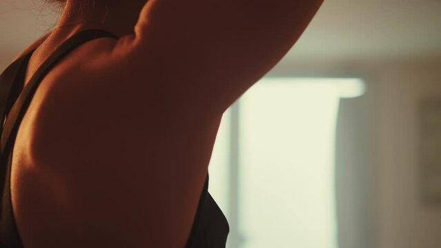 Woman exercising with ropes closeup