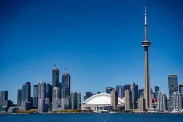 Naklejka premium View of Toronto Downtown from Lake Ontario. Toronto, Canada - April 30, 2024.