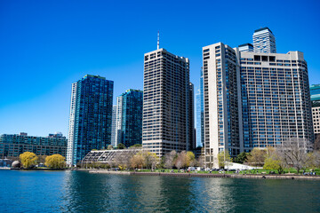 View of Toronto waterfront park and buildings from Lake Ontario.