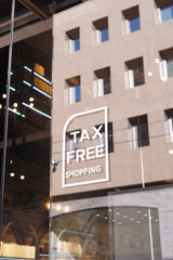 shop tax free text duty free shop sign on shop window 