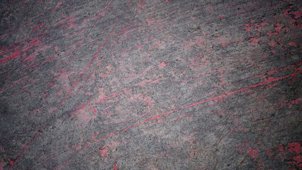Cement or concrete surface background with stains and decay mixed with small grains. With a red-black gradient. For backdrops, banners, scenes, old, dark.