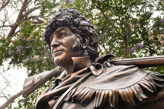San Antonio, Texas - USA: Detail of bronze sculpture of Davy Crockett in Alamo Plaza