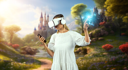 Girl wearing VR glasses while holding phone and pointing at view. Happy woman surprised while...