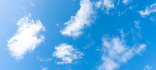 Obraz premium Beautiful blue sky with strange shape of clouds in the morning or evening used as natural background texture in decorative art work