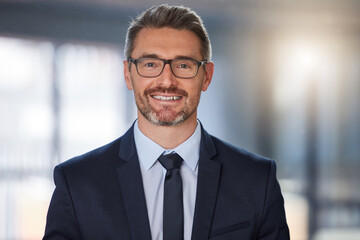 Business, smile and portrait of mature man in office for confidence, happiness or management. Lens...