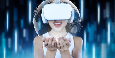 Female stand and wear white VR headset and white sleeveless connect metaverse, future technology,...