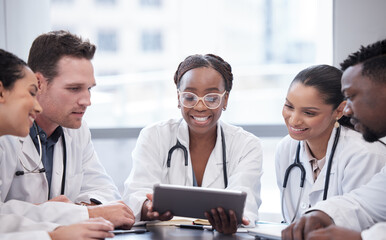 Smile, doctor and team on tablet for planning research, healthcare or people in discussion in...