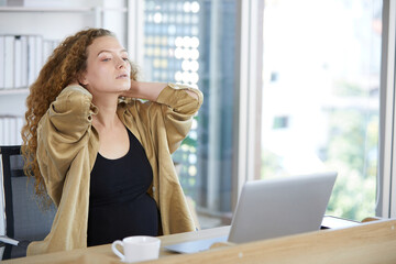 businesswoman suffering or have a neck pain from work in the office