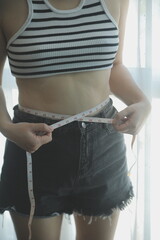 Women body fat belly. Obese woman hand holding excessive belly fat. diet lifestyle concept to...