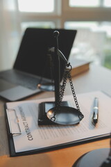 Business and lawyers discussing contract papers with brass scale on desk in office. Law, legal...