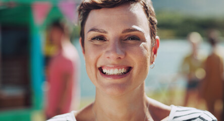 Woman, closeup and portrait in park with smile for career, summer and travel employee or happiness....