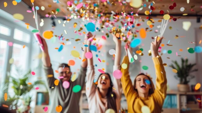 A group of people joyfully celebrating, throwing confetti in the air