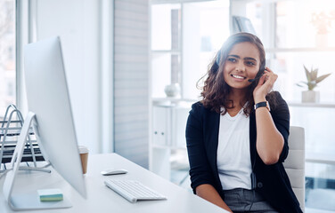 Happy woman, computer and consultant with headphones in call center, customer service or support at...