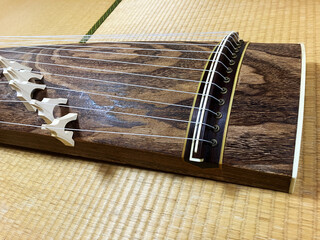 A Koto, a traditional 13 stringed instrument on the tatami mats of the Japanese-style room. Up of...