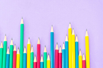 Set of multi-colored pencils background. Extreme close up view