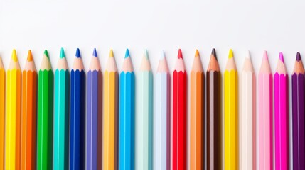 A vibrant array of colored pencils lined up against a white background