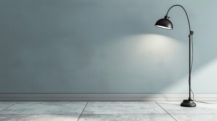 Light gray wall with a solitary industrial metal lamp