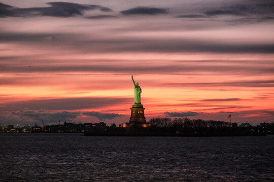 statue of liberty at sunset