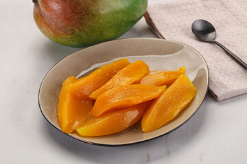 Canned mango slices in the bowl