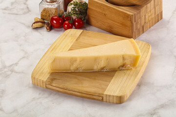 Hard parmesan cheese piece triangle