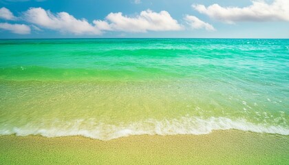 soft glittering green sand and turquoise water waves; beautiful seascape
