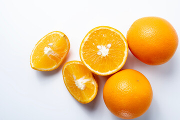 Ripe orange fruit isolated on white background.