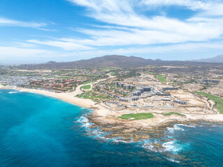 Fototapeta premium Aerial view of tropical beach with resorts in Cabo San Jose, Baja California Sur, Mexico