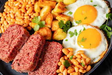 corned beef, baked beans, potatoes and fried eggs