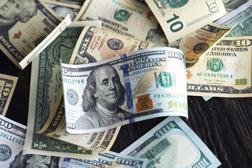 Money, US dollar bills background. Money scattered on the desk. Photography for Finance and Economy...