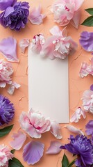 White card adorned with pink and purple flowers and petals