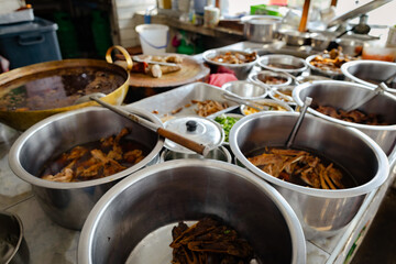 Asian noodles with stewed and braised duck in many brown soup