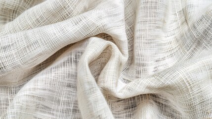 Delicate cloth material with a white woven pattern.