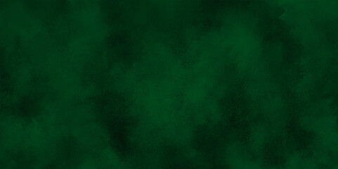 Abstract painting by green watercolor ink, abstract creative clouds covered blur green grunge background, Deep dark green abstract grunge texture, Green art old green paper textured or background.

