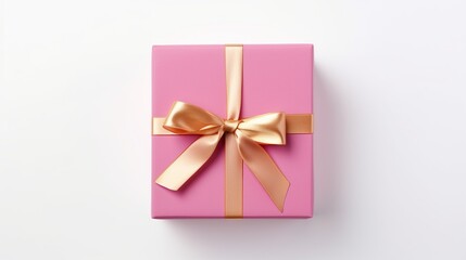 Pink gift box with golden ribbon on white background.