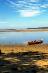 A canoe moored in a sheltered lagoon in the Inhaca Barrier Island System of the coast of Mozambique...