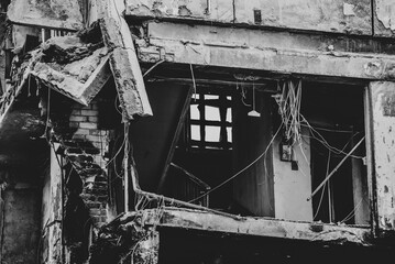 destroyed and burned houses in the city during the war in Ukraine