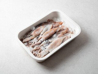 baby squid on a plate	