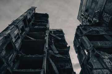 destroyed and burned houses in the city during the war in Ukraine