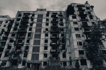 destroyed and burned houses in the city during the war in Ukraine