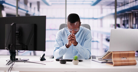 Contemplative Business Man At Desk