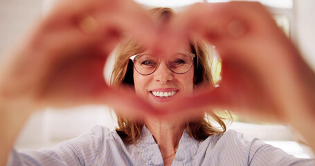 Woman Making Heart Sign
