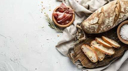 Wooden boards with salted lard and bread on light background
