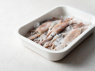 baby squid on a plate	