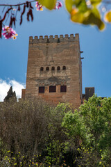View of Alhambra tower from Paseo dos Tristes in Granada, Spain