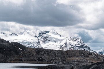 pastoruri glacier landscape with a laguna in snow covered andes in the national park Huascarán