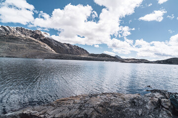 pastoruri glacier landscape with a laguna in snow covered andes in the national park Huascarán