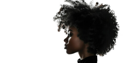 Silhouette of an African American woman with afro hairstyle standing against a white background