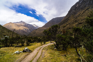 landscape on the way to laguna 69 with a laguna in snow covered andes in the national park Huascarán