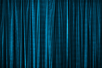 blue curtain in theatre.