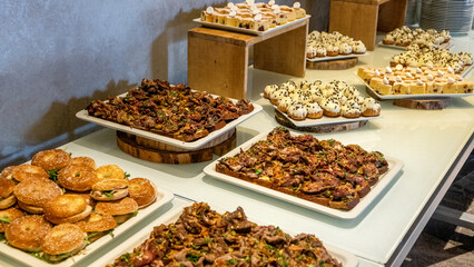 Wedding buffet table, event dessert food catering for wedding, party and holiday celebration,...